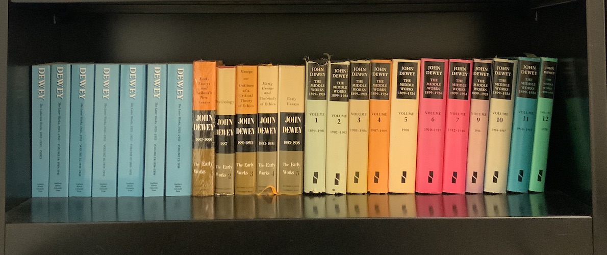 Bookshelf full of John Dewey's Collected Works