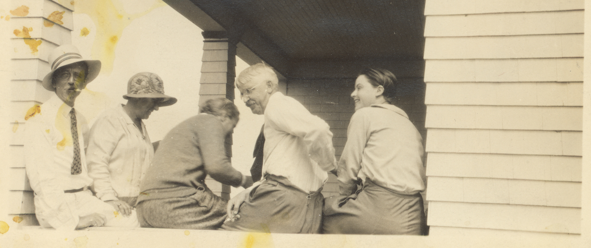 John Dewey with friends on a porch